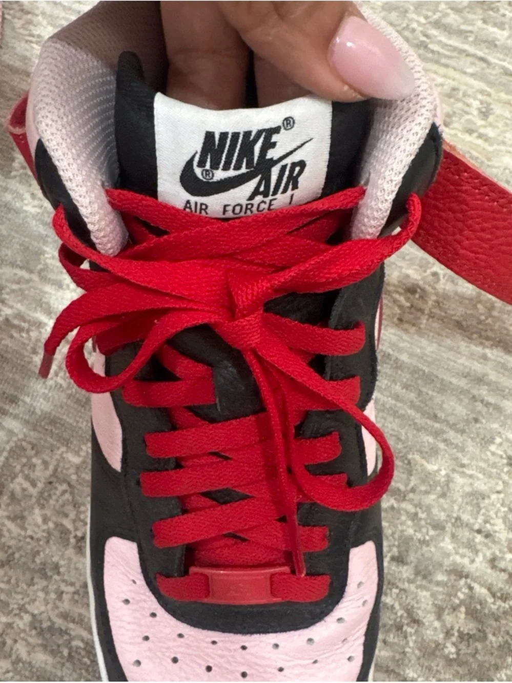Nike Air Force 1 Pink and Red Black-Accented High-Top Sneakers